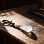 Natural agate five-element healing pendant for strengthening the metal element, with a peace-themed keychain