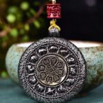 Rotatable Mountain Ghost Coin Necklace for Protection and Peace
