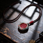 Rotatable Mountain Ghost Coin Necklace for Protection and Peace