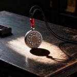 Rotatable Mountain Ghost Coin Necklace for Protection and Peace