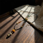Tiger – Tooth Dzi Bead Amber Beaded Necklace
