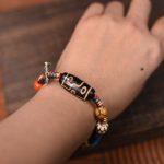 Nine-Eye Dzi Bead Braided Bracelet