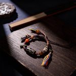 Nine-Eye Dzi Bead Braided Bracelet