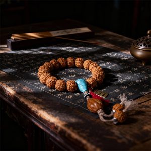 Rudraksha Bracelet with Olive Pit Pendant