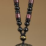 Golden Obsidian Double Dragon Pendant